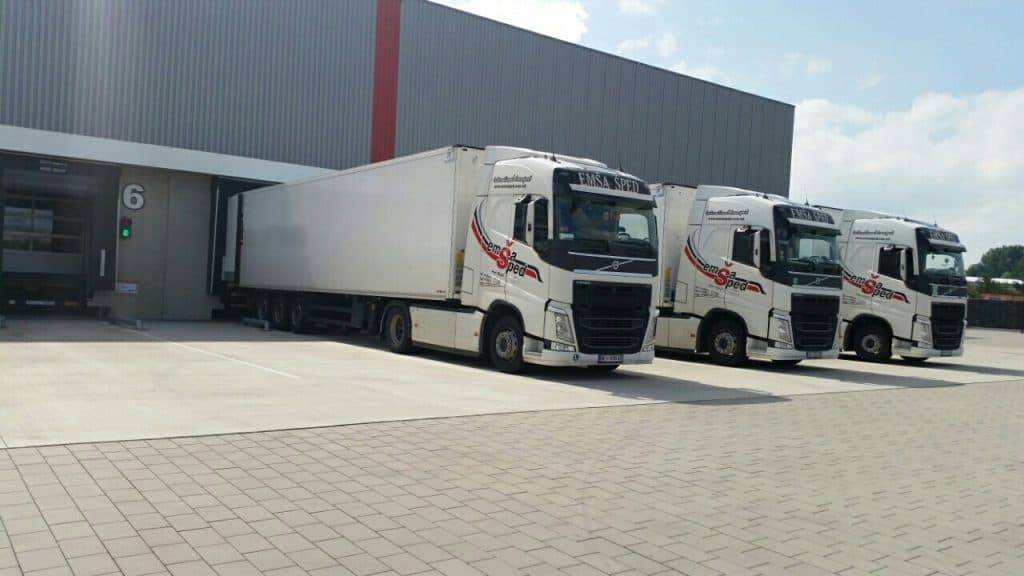 transport logistics emsa sped trucks facing right